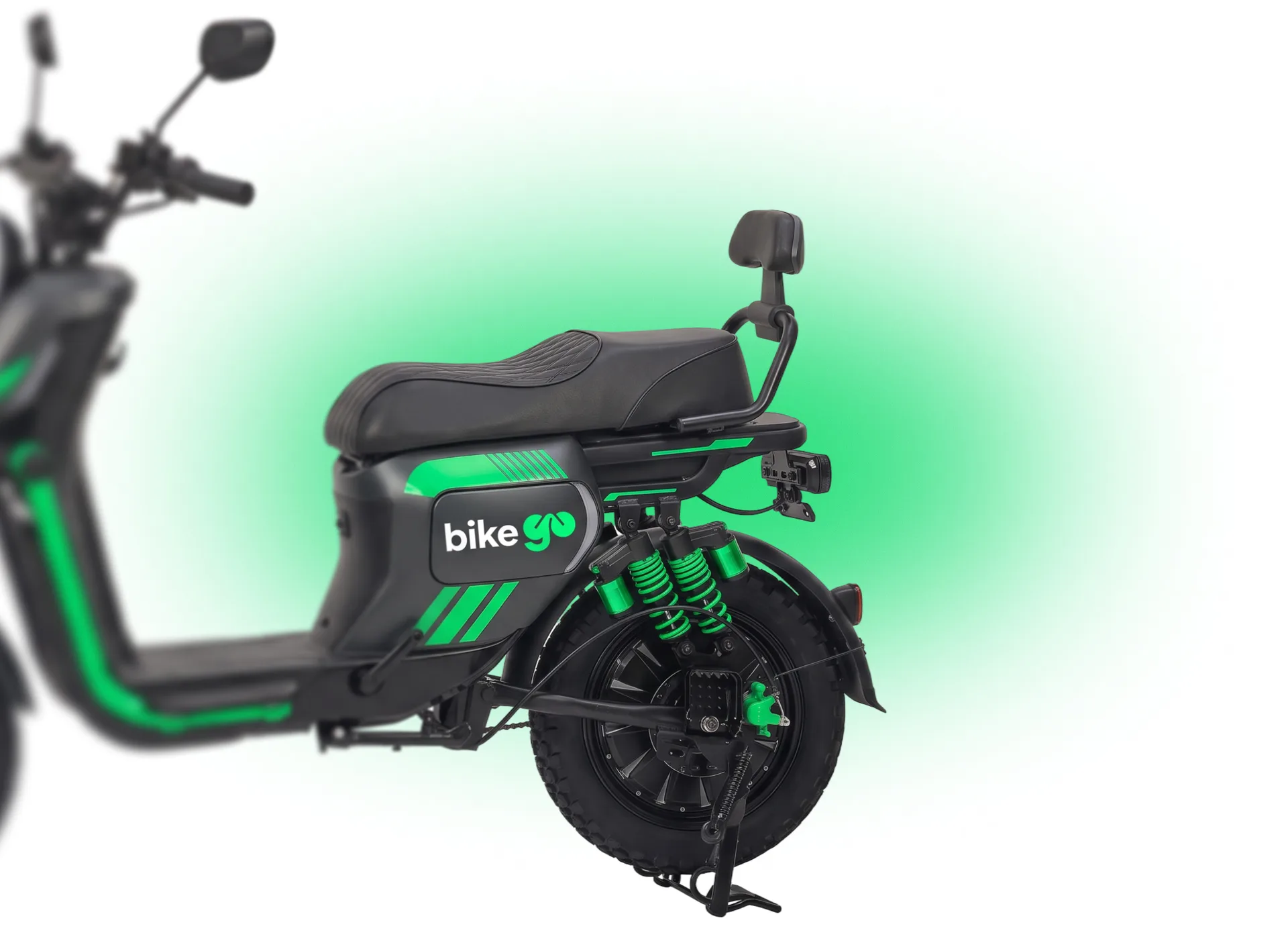 Электровелосипед bikego с логотипом на боковине и зелёными амортизаторами